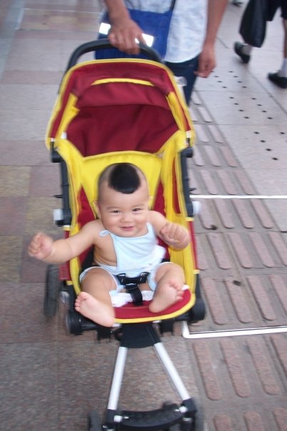 Cute baby with a weird haircut in Taidong