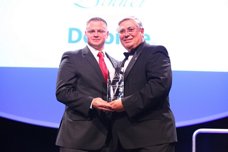 Christopher Houseman receives his award as ALPFA National Student of the Year from Manny Espinoza, ALPFA CEO.