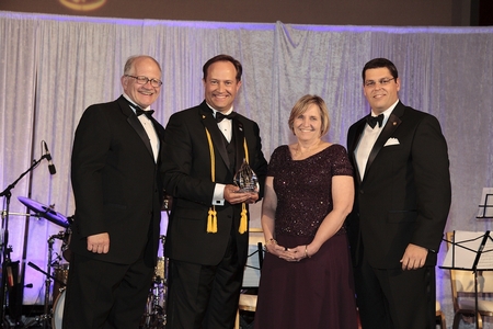 FIU President Mark B. Rosenberg; Alfredo Cepero; Joyce J. Elam, executive dean of the business school; and Joaquin “Jack” Gonzalez (BBA ’97), president, FIU Alumni Association