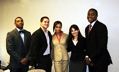 Gabriel Mendoza, second from left, and his team were the first-place finishers in the program’s major task: business development project and presentation.