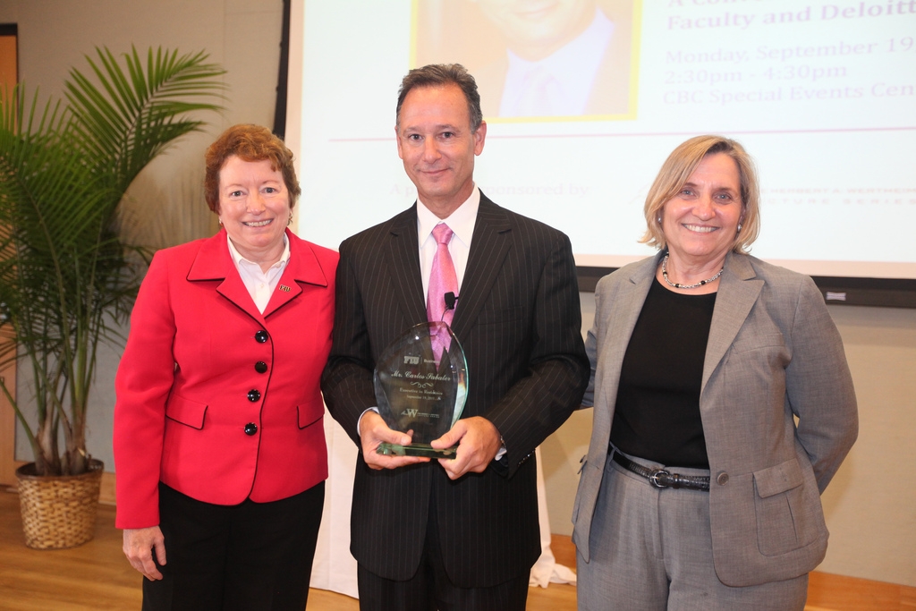 Ruth Ann McEwen, director, School of Accounting; Carlos Sabater; and Joyce J. Elam