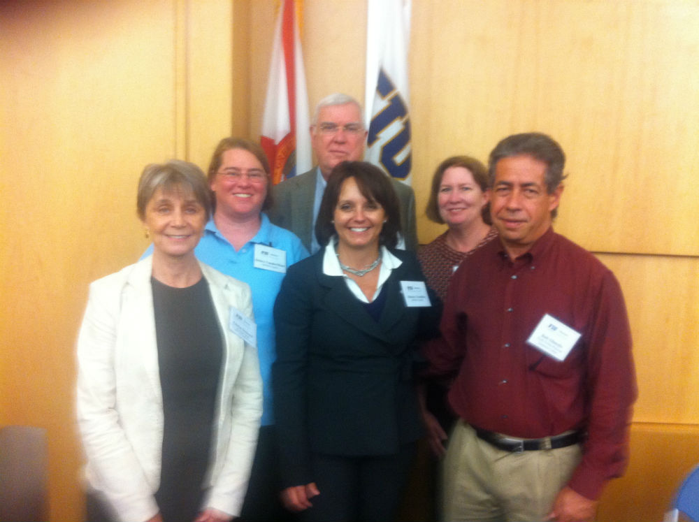 Gloria Deckard, MSMIS faculty member Debra VanderMeer, Christopher B. Sullivan, Monica Chiarini Tremblay, Melissa E. Hargiss and Bob Olmedo