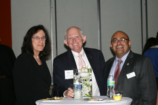 Ellen Forman, assistant director, media relations and communications, Barry Shiflett and Angel Burgos, executive director, MBA programs