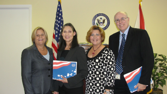 Ileana Ros-Lehtinen; Maria I. Perez; Ana Raposo; and Ron Albert, Plantation territory manager, IRS