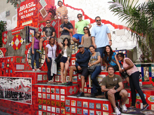 The students with faculty member Ronaldo Parente, seated, at the St. Teresa staircase—or Selaron’s Staircase—which includes tiles from all over the world and which has been in process by Jorge Selaron for more than twenty years.