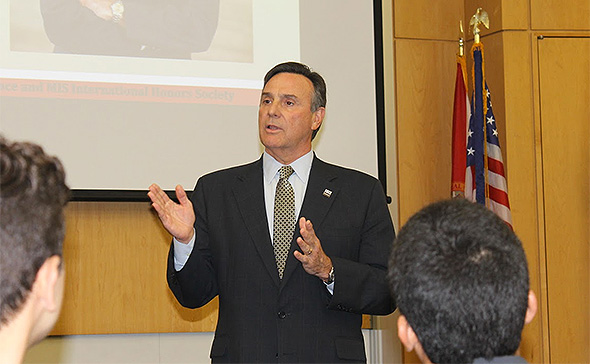 Dean Aldrich addresses the Beta Alpha Psi meeting