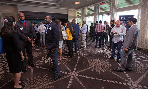 Students and attendees networking before the 2015 Developer Luncheon gets underway