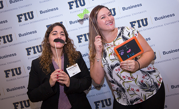 Jennifer Mohammed and COB student Katarina Perez strike a pose at mentoring program kick off 