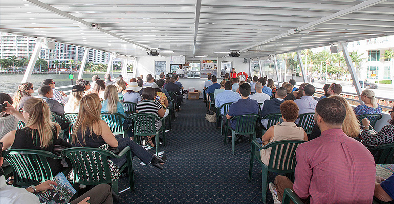 Real estate students explore Development along the Downtown Miami River