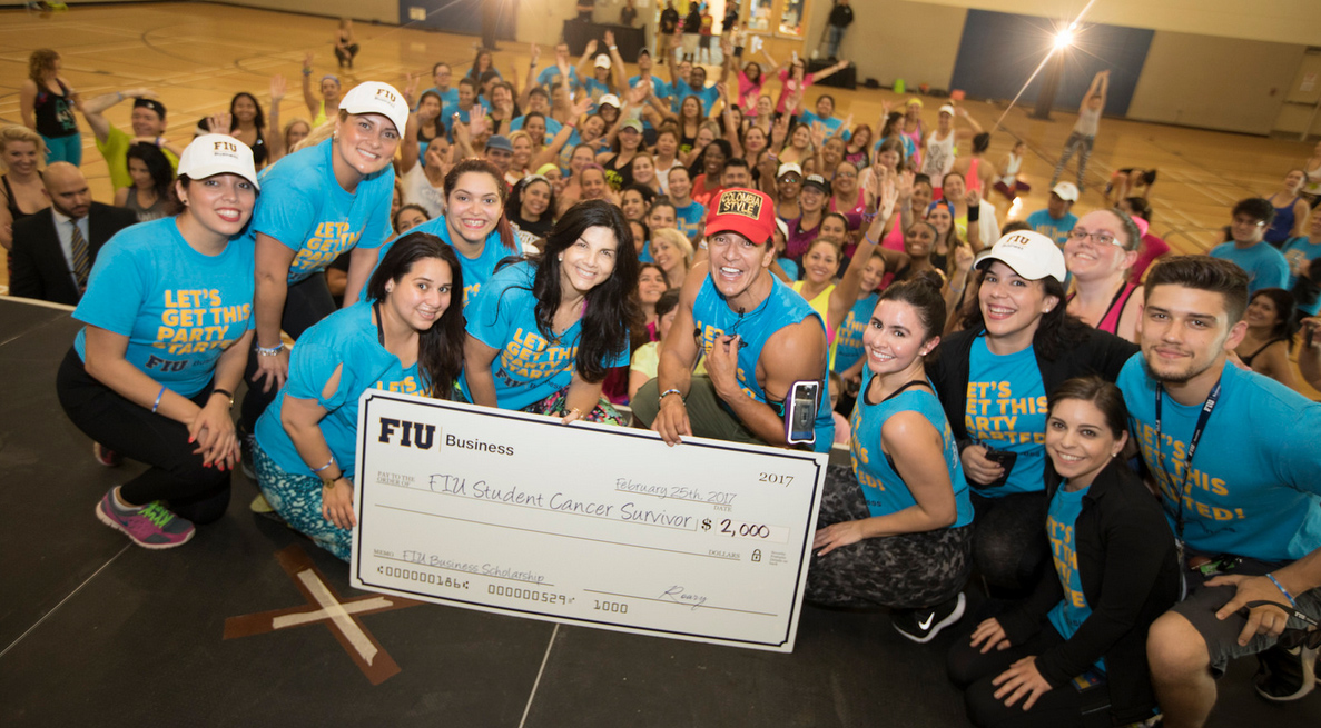 Zumba co-founder Beto Perez stages a dance-out for College of Business charity.