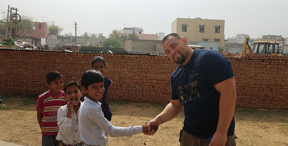 MAGA Student Jason Carmona and Bandhwari kids