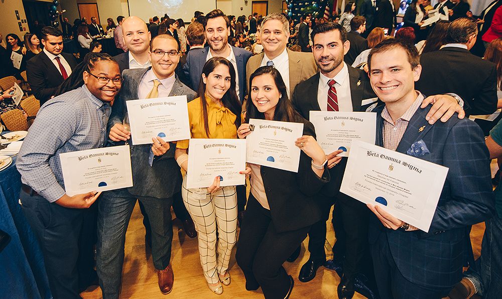 Prestigious business honor society celebrates FIU Business induction.