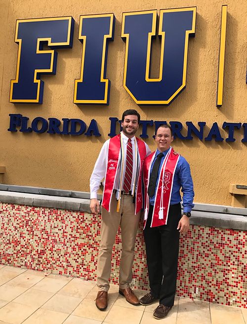 Sasha with finance classmate John Fields, now serving as a second lieutenant in the U.S. Marines, stationed in Okinawa.